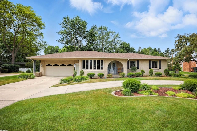 5350 Fieldcrest Dr, Shelby Twp, MI 48316 - single story home with a garage, brick siding, concrete driveway, and a front yard