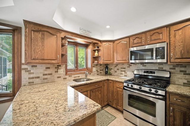 5350 Fieldcrest Dr, Shelby Twp, MI 48316 - kitchen with stainless steel appliances, open shelves, light stone countertops, plenty of natural light, and recessed lighting