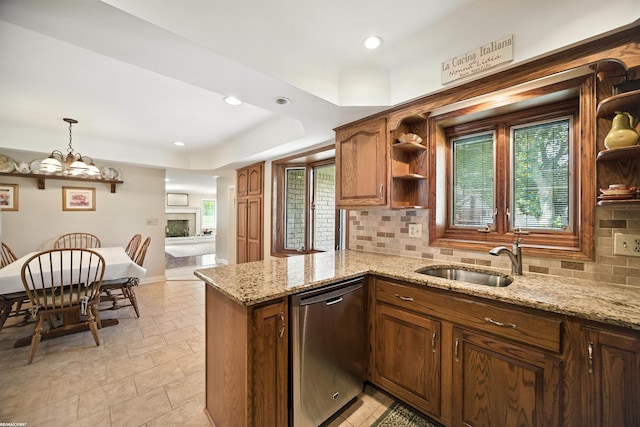 5350 Fieldcrest Dr, Shelby Twp, MI 48316 - kitchen featuring stainless steel dishwasher, open shelves, tasteful backsplash, light stone countertops, and hanging light fixtures