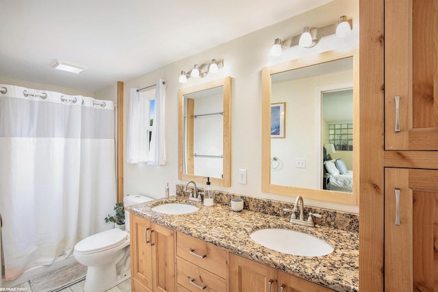 46329 Community Center Dr, Chesterfield Twp, MI 48047 - ensuite bathroom featuring double vanity and tile patterned flooring