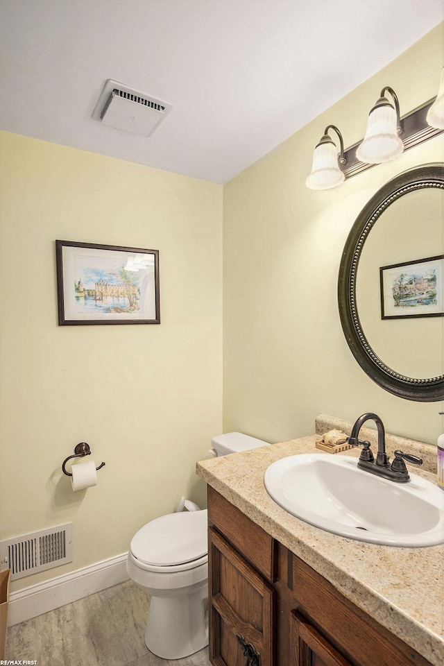 46329 Community Center Dr, Chesterfield Twp, MI 48047 - bathroom featuring vanity and wood finished floors