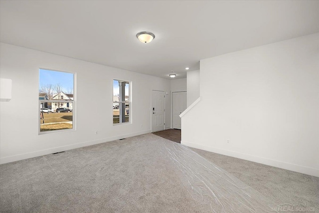 1718 W 12 Mile Rd, Royal Oak, MI 48073 - spare room with carpet and baseboards
