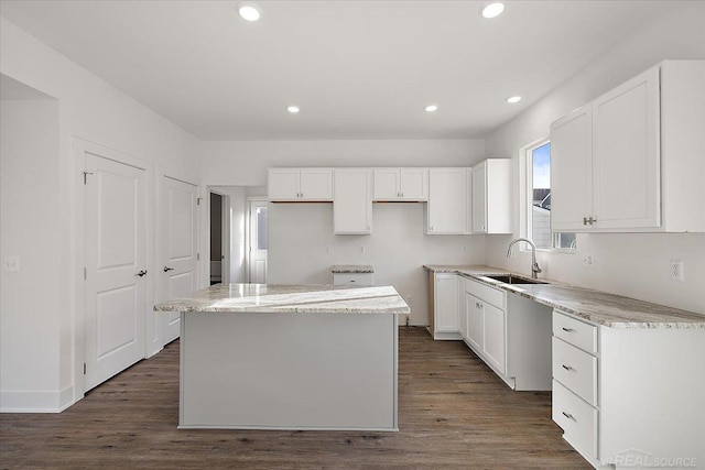 1718 W 12 Mile Rd, Royal Oak, MI 48073 - kitchen featuring a kitchen island, white cabinetry, recessed lighting, and dark wood-type flooring