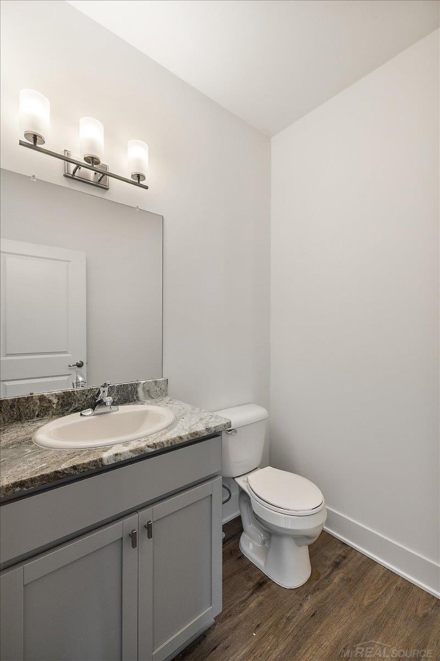 1718 W 12 Mile Rd, Royal Oak, MI 48073 - half bath with wood finished floors and vanity