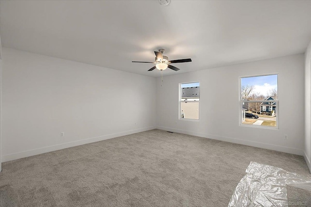 1718 W 12 Mile Rd, Royal Oak, MI 48073 - unfurnished room with a ceiling fan and light colored carpet