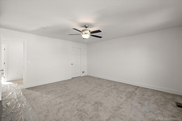 1718 W 12 Mile Rd, Royal Oak, MI 48073 - empty room featuring a ceiling fan, carpet flooring, and a smoke detector
