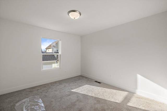 1718 W 12 Mile Rd, Royal Oak, MI 48073 - carpeted empty room featuring baseboards