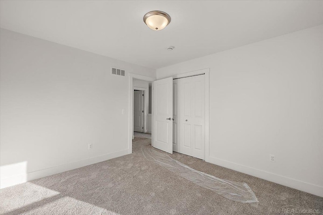 1718 W 12 Mile Rd, Royal Oak, MI 48073 - unfurnished bedroom featuring carpet floors and a closet