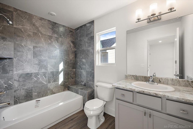 1718 W 12 Mile Rd, Royal Oak, MI 48073 - bathroom with vanity, wood finished floors, and shower / tub combination