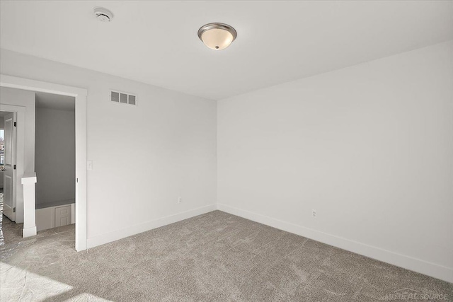 1718 W 12 Mile Rd, Royal Oak, MI 48073 - carpeted empty room featuring baseboards and a smoke detector