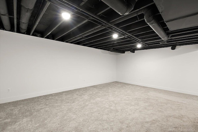 1718 W 12 Mile Rd, Royal Oak, MI 48073 - finished basement featuring carpet floors and baseboards