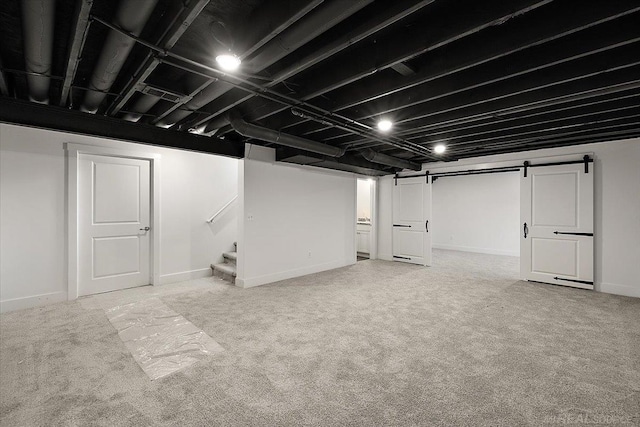 1718 W 12 Mile Rd, Royal Oak, MI 48073 - finished basement featuring a barn door, carpet flooring, and stairway