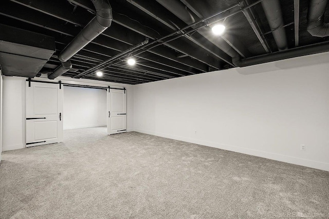 1718 W 12 Mile Rd, Royal Oak, MI 48073 - finished below grade area with a barn door and carpet flooring
