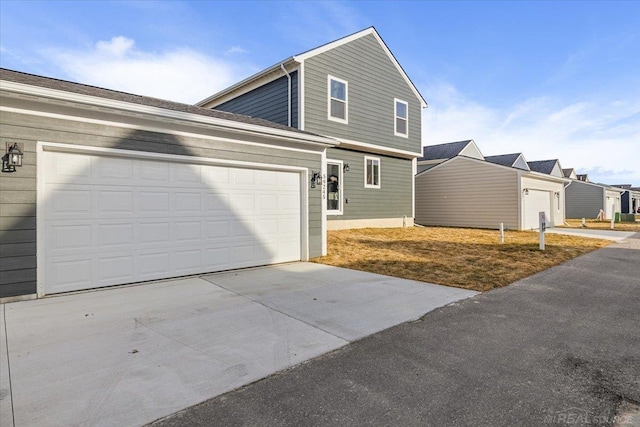 1718 W 12 Mile Rd, Royal Oak, MI 48073 - view of front of house featuring driveway and a garage