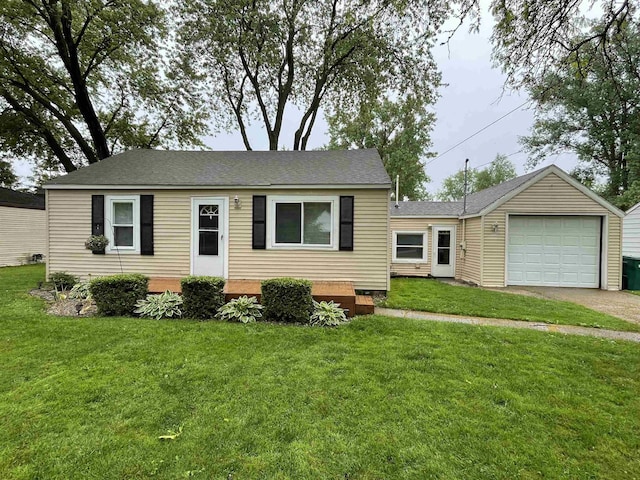 3366 L And L Ct, Bay City, MI 48706 - view of front facade with a front yard, driveway, and roof with shingles