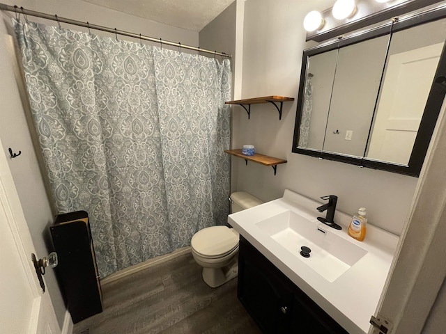 3366 L And L Ct, Bay City, MI 48706 - bathroom with wood finished floors, vanity, and a shower with shower curtain