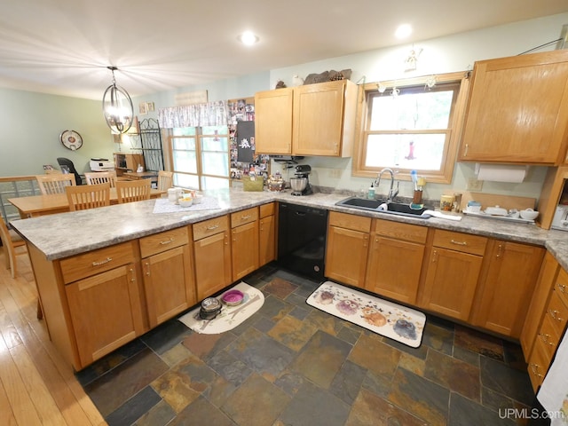 2004 Hunters Ln, Houghton, MI 49931 - kitchen featuring dishwasher, a peninsula, decorative light fixtures, light stone counters, and recessed lighting