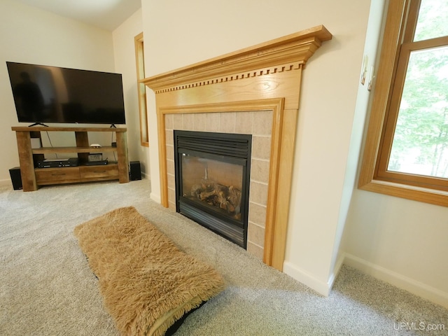 2004 Hunters Ln, Houghton, MI 49931 - detailed view of carpet floors and a tile fireplace