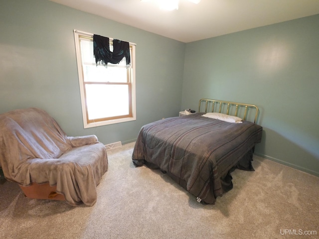 2004 Hunters Ln, Houghton, MI 49931 - carpeted bedroom featuring baseboards