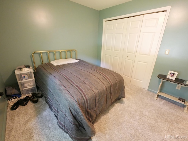 2004 Hunters Ln, Houghton, MI 49931 - carpeted bedroom featuring a closet