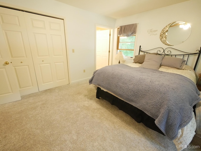 2004 Hunters Ln, Houghton, MI 49931 - bedroom featuring carpet and a closet