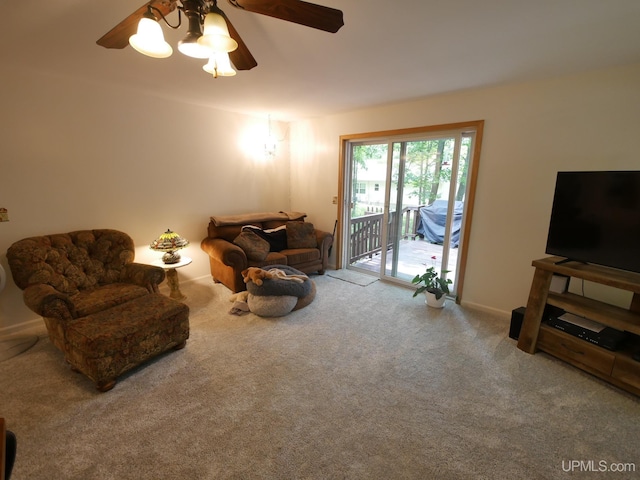 2004 Hunters Ln, Houghton, MI 49931 - carpeted living room with a ceiling fan and baseboards