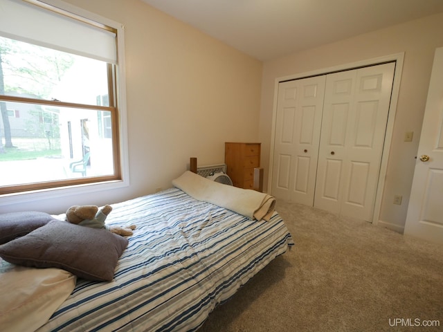 2004 Hunters Ln, Houghton, MI 49931 - carpeted bedroom with multiple windows and a closet