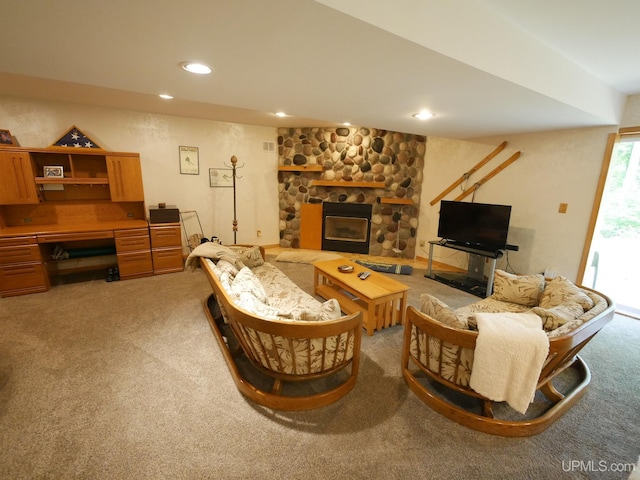 2004 Hunters Ln, Houghton, MI 49931 - carpeted living room featuring a stone fireplace and recessed lighting