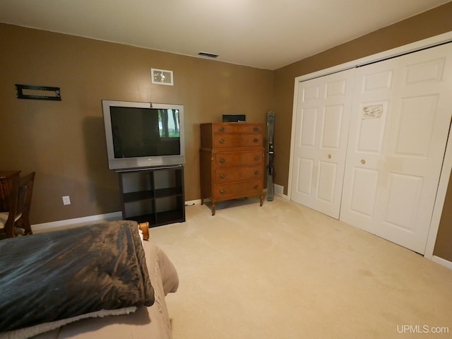 2004 Hunters Ln, Houghton, MI 49931 - carpeted bedroom with baseboards and a closet