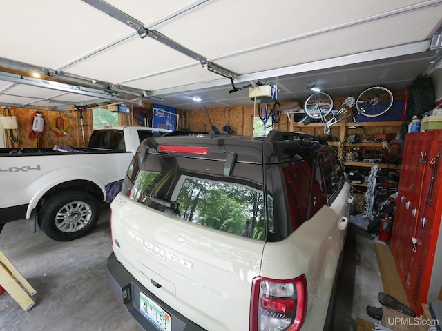 2004 Hunters Ln, Houghton, MI 49931 - garage with a garage door opener
