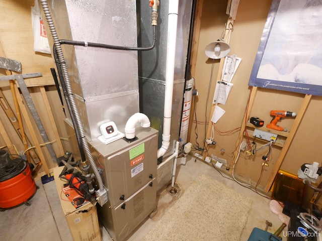 2004 Hunters Ln, Houghton, MI 49931 - utility room with heating unit