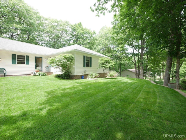 2004 Hunters Ln, Houghton, MI 49931 - view of grassy yard