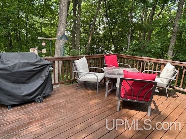 2004 Hunters Ln, Houghton, MI 49931 - wooden terrace with a grill