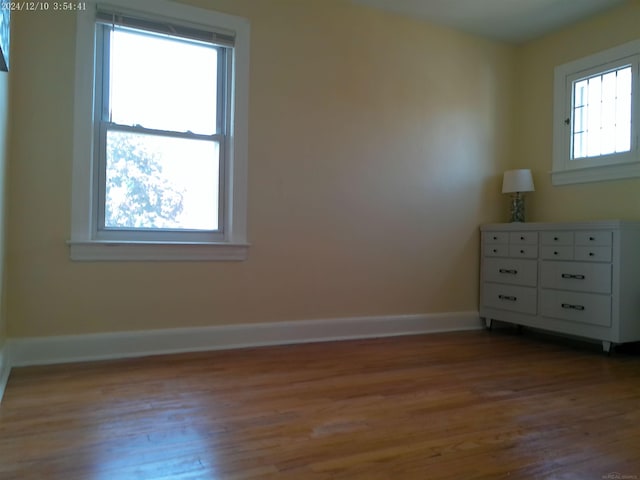 15553 Mclain Ave, Allen Park, MI 48101 - unfurnished room featuring wood finished floors and baseboards