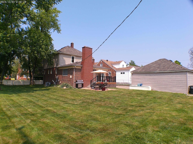 15553 Mclain Ave, Allen Park, MI 48101 - back of property with a patio and brick siding