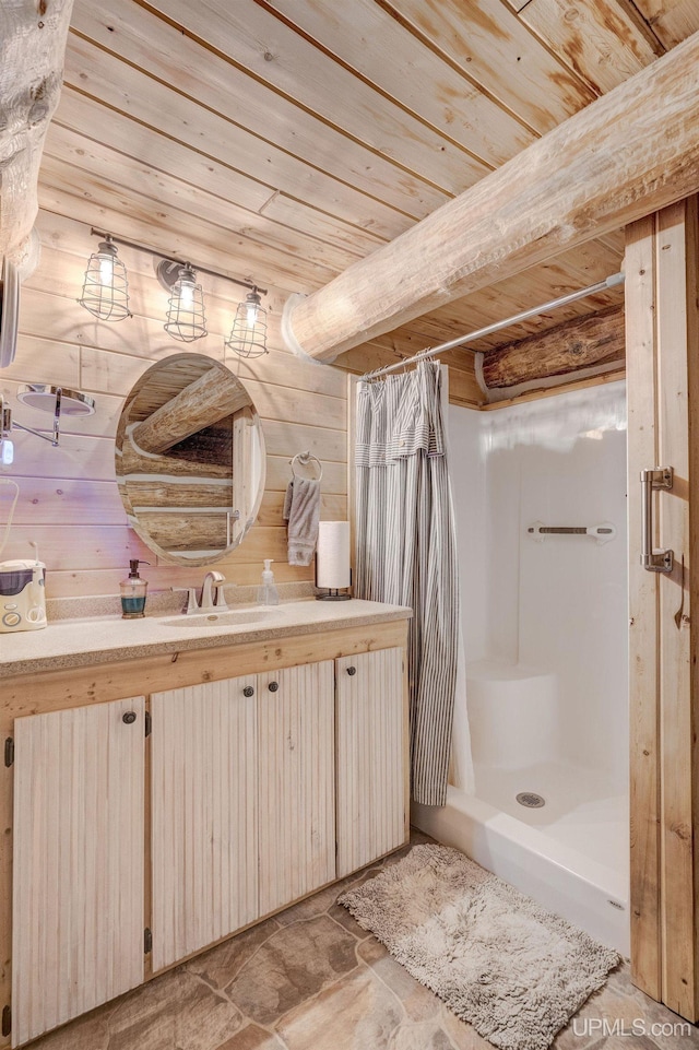 14038 24.5 Ln, Rapid River, MI 49878 - bathroom with wooden ceiling, a stall shower, vanity, and wood walls