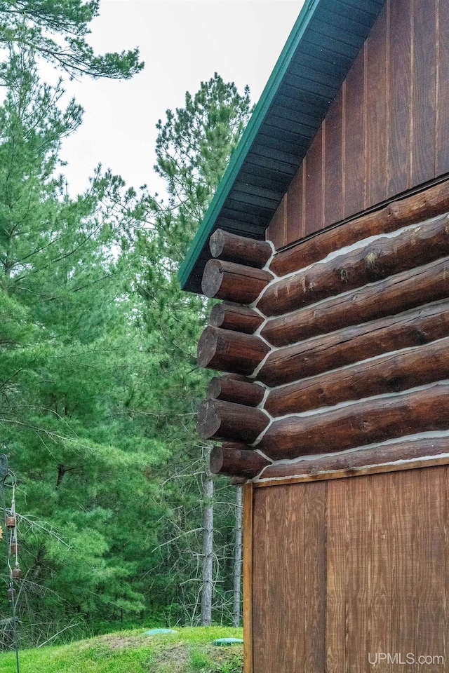 14038 24.5 Ln, Rapid River, MI 49878 - exterior view of log siding