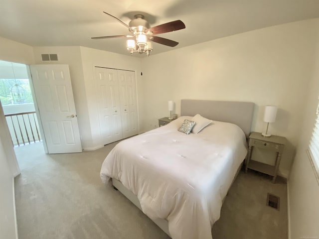 24781 Camille St, Harrison Twp, MI 48045 - bedroom featuring light carpet, a ceiling fan, and a closet