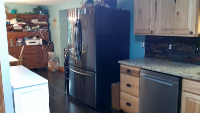2849 Shaffer Rd, Beaverton, MI 48612 - kitchen featuring dishwashing machine, freestanding refrigerator, and light countertops