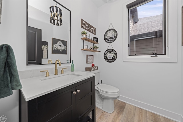 54877 Camden Ct, Shelby Twp, MI 48316 - bathroom with vanity and wood finished floors
