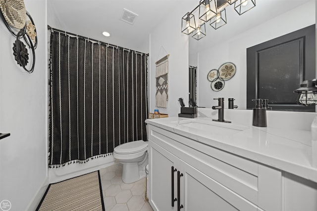 54877 Camden Ct, Shelby Twp, MI 48316 - bathroom featuring vanity, tile patterned floors, shower / bath combo with shower curtain, and recessed lighting