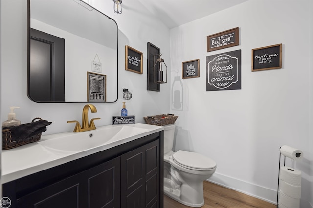 54877 Camden Ct, Shelby Twp, MI 48316 - half bathroom featuring wood finished floors and vanity