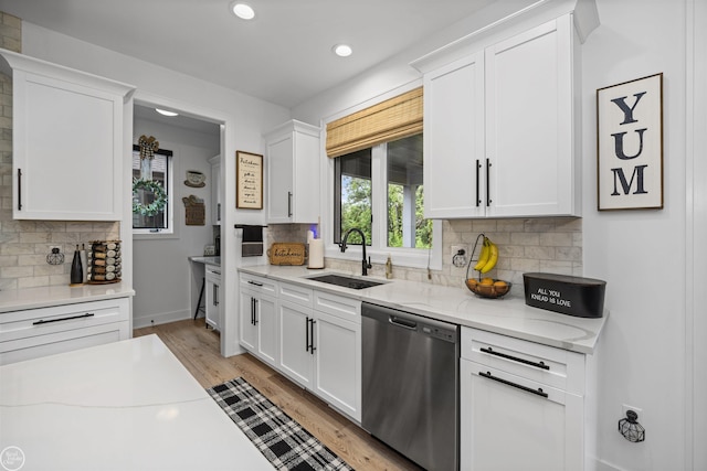 54877 Camden Ct, Shelby Twp, MI 48316 - kitchen with dishwasher, tasteful backsplash, recessed lighting, and white cabinets