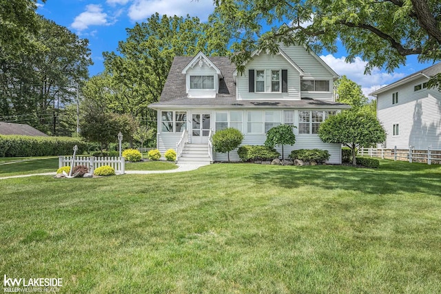 1520 S Channel Dr, Harsens Island, MI 48028 - view of front of house with a shingled roof