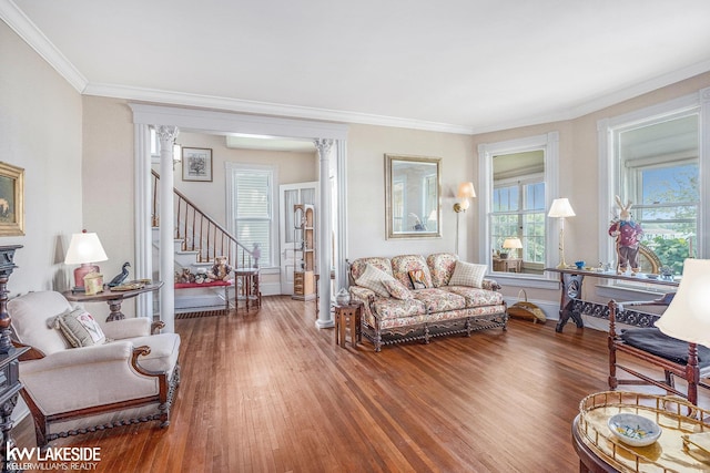1520 S Channel Dr, Harsens Island, MI 48028 - living room with crown molding, stairway, and wood finished floors