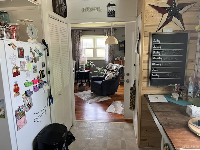 754 Duncan Ave, Ishpeming, MI 49849 - kitchen featuring freestanding refrigerator and tile patterned floors