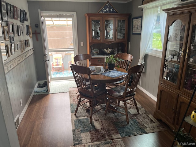 754 Duncan Ave, Ishpeming, MI 49849 - dining area featuring dark wood-style floors and plenty of natural light