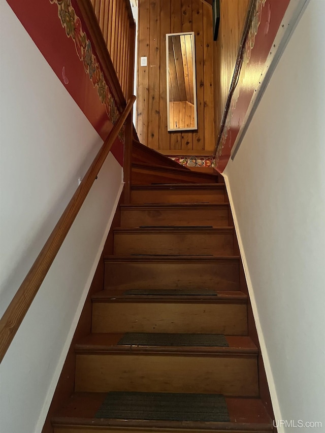754 Duncan Ave, Ishpeming, MI 49849 - staircase featuring baseboards