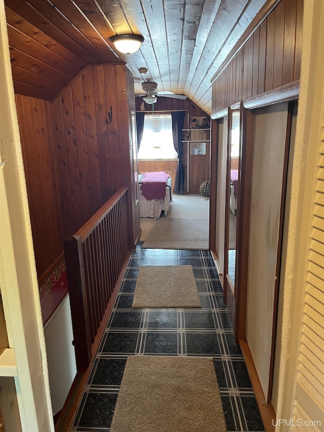 754 Duncan Ave, Ishpeming, MI 49849 - hallway featuring lofted ceiling, wooden walls, and wood ceiling