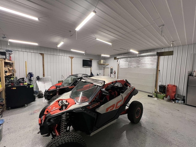 6242 N Geneva Rd, Coleman, MI 48618 - garage featuring freestanding refrigerator